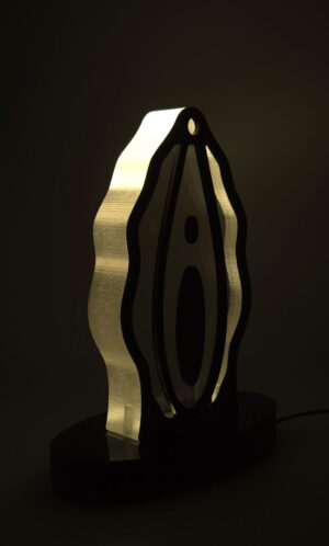 Medusa black acrylic lamp from the Luster & Linger Obsession Edition lit
